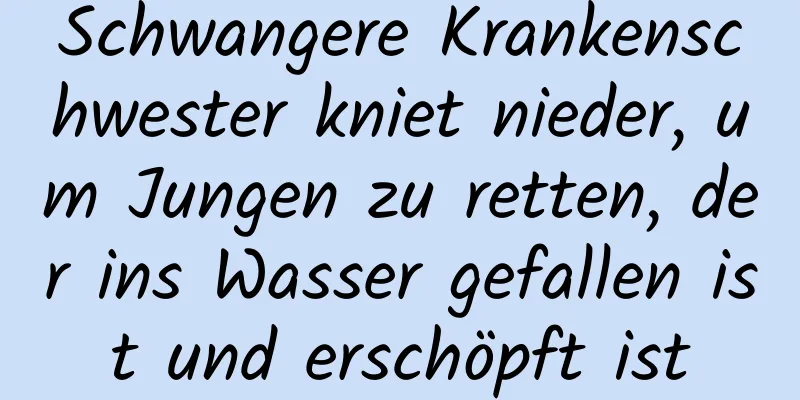 Schwangere Krankenschwester kniet nieder, um Jungen zu retten, der ins Wasser gefallen ist und erschöpft ist